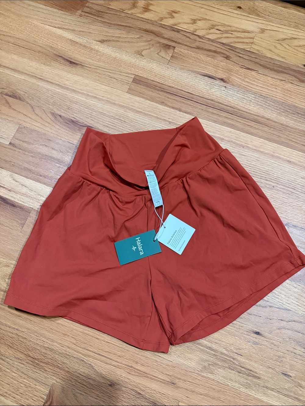 HALARA Women's High-Rise Athletic Shorts in Rust Red